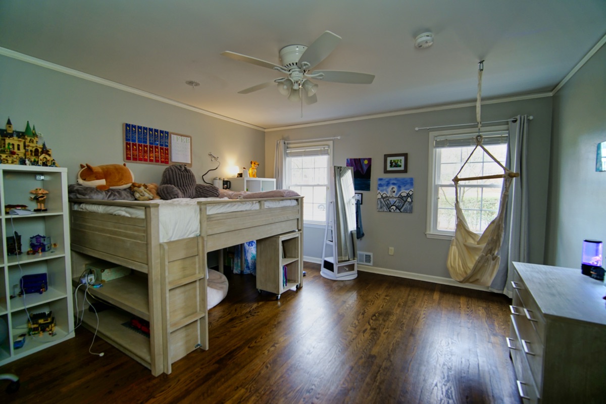 Bedroom with loft bed, ceiling fan, and hardwood floors